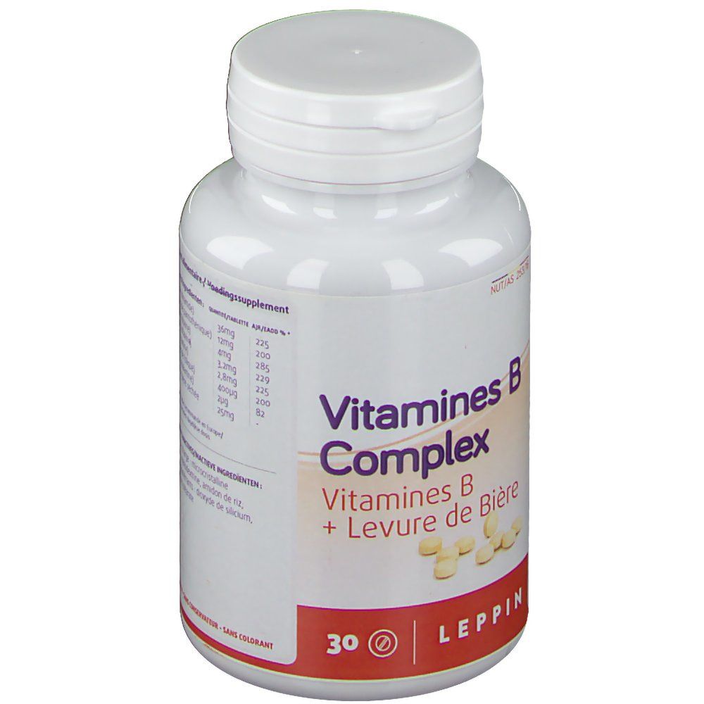 Flacon blanc de vitamines B Complex. Inscription: Leppin, 30 comprimés. Comprimés visibles.