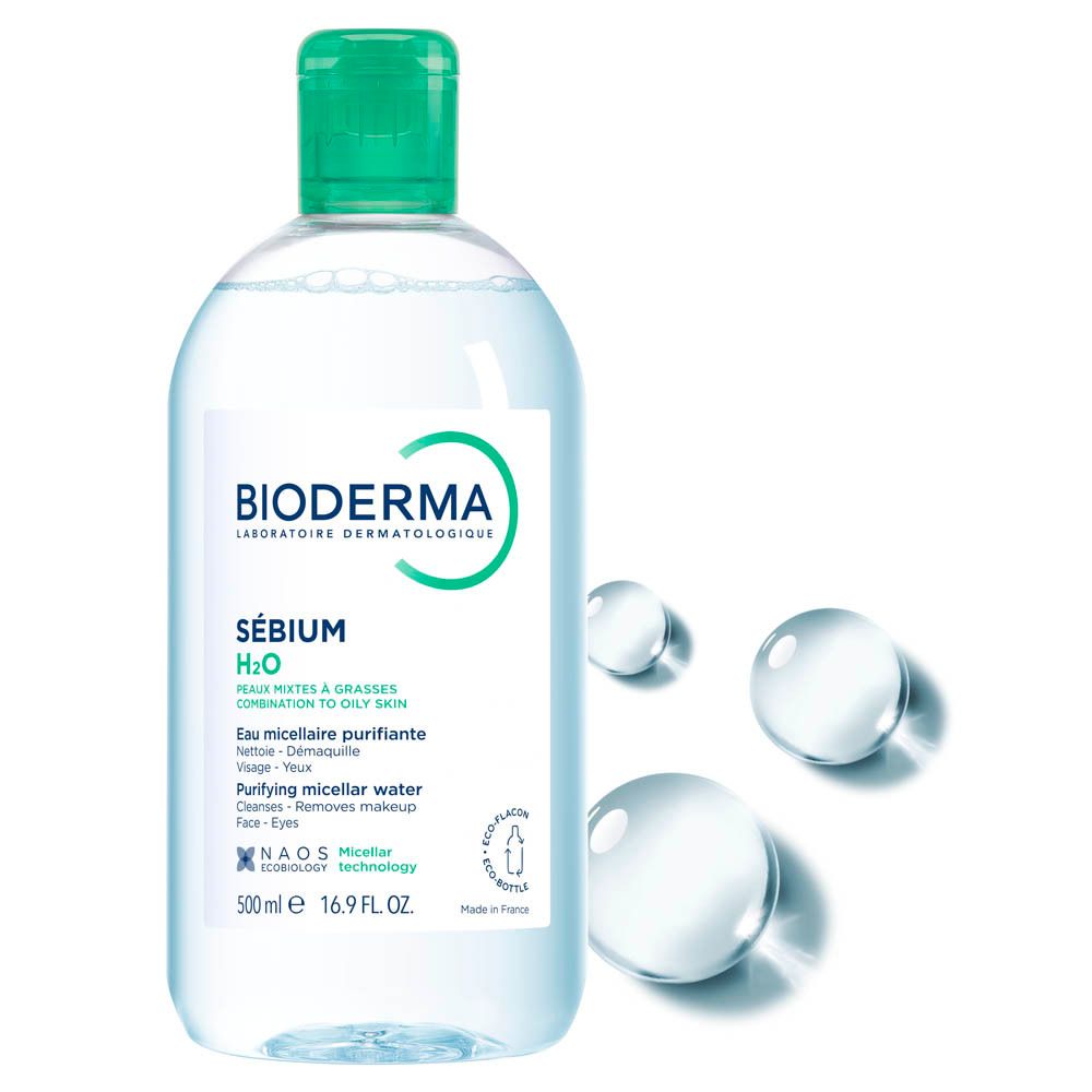 Achterkant van de BIODERMA Sébium H2O fles. Meertalige tekst. Groen-wit etiket. Transparante vloeistof.