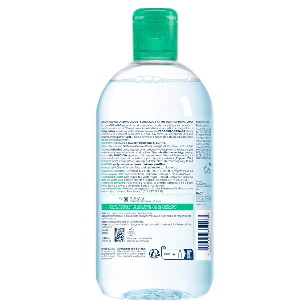 Achterkant van de BIODERMA Sébium H2O fles. Meertalige tekst. Groen-wit etiket. Transparante vloeistof.