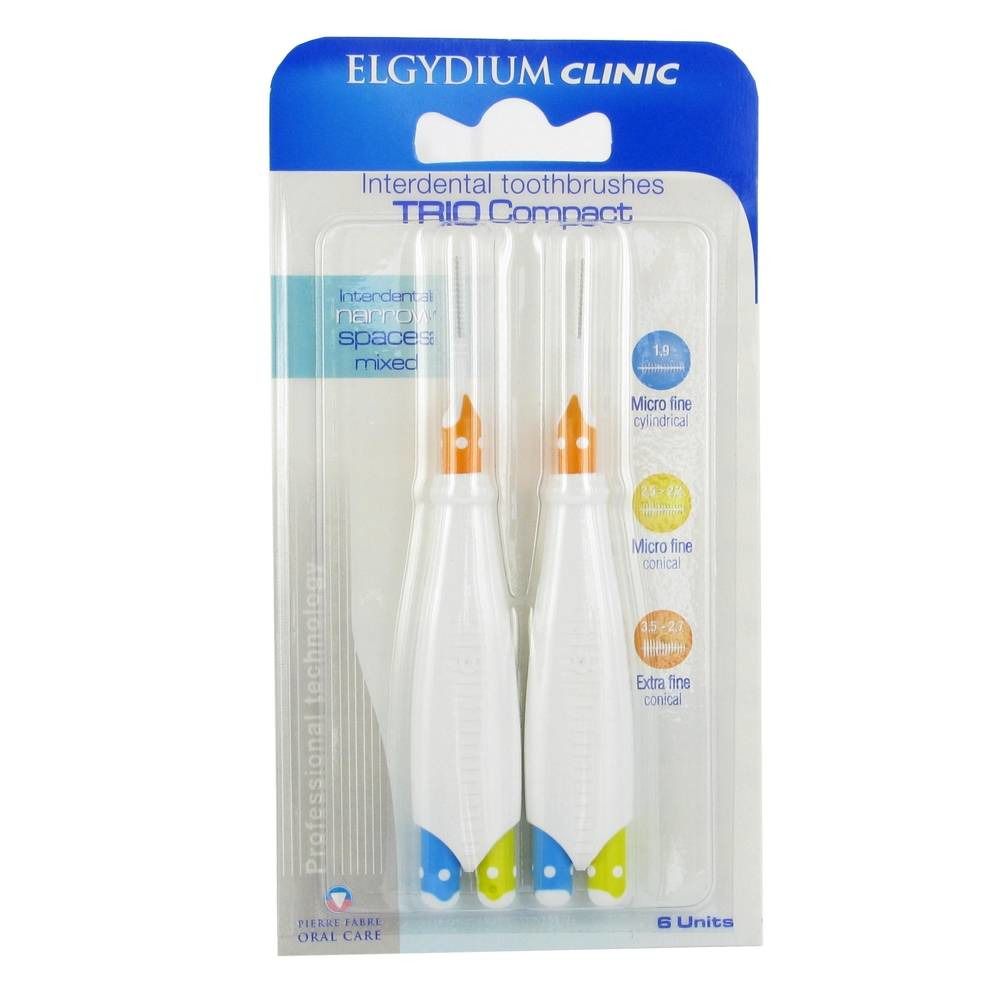 Deux brosses interdentaires en blister. Manches blancs, pointes colorées. Nom du produit et marque visibles.