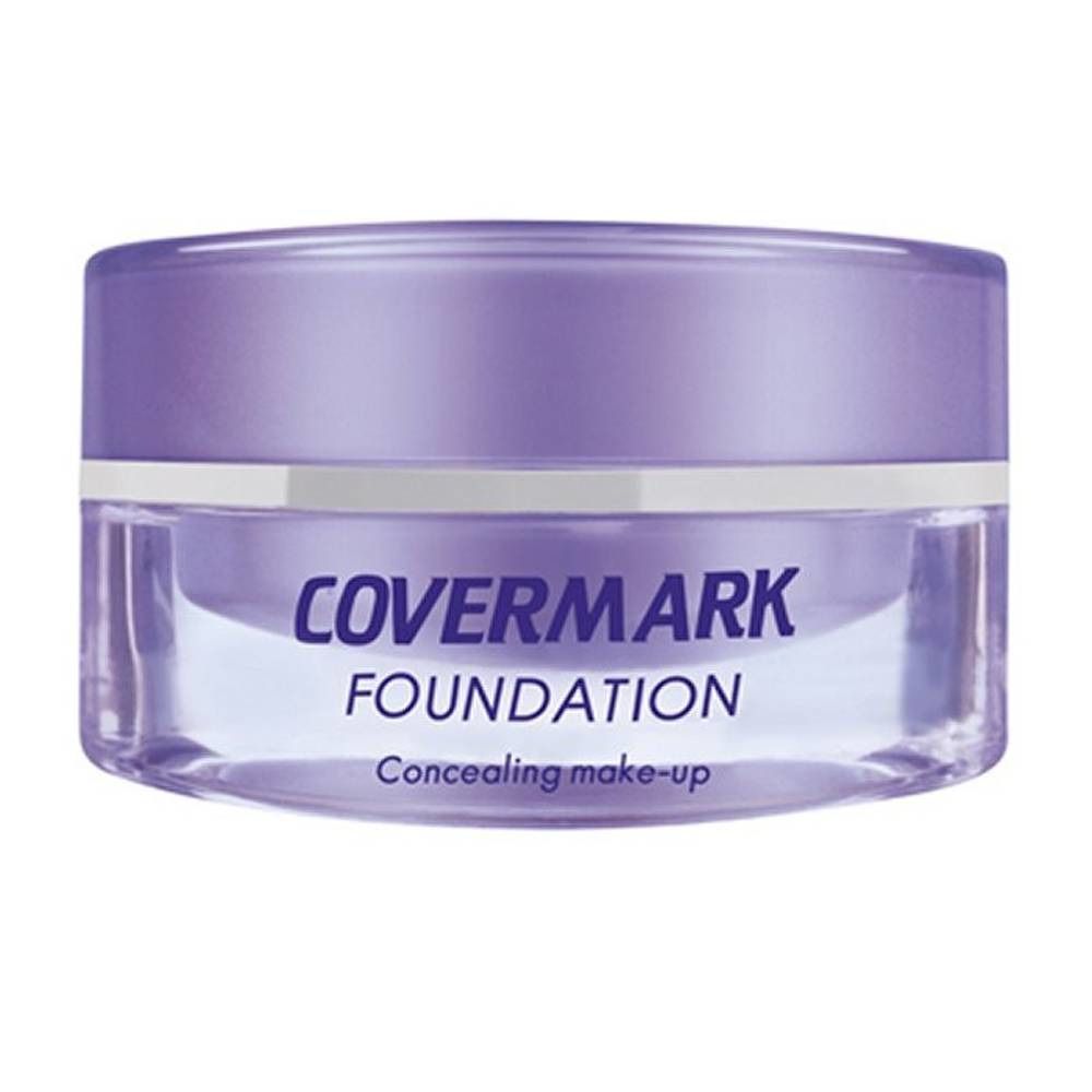 Potje Covermark Foundation. Paarse deksel, transparante basis. Opschrift 'COVERMARK FOUNDATION'.