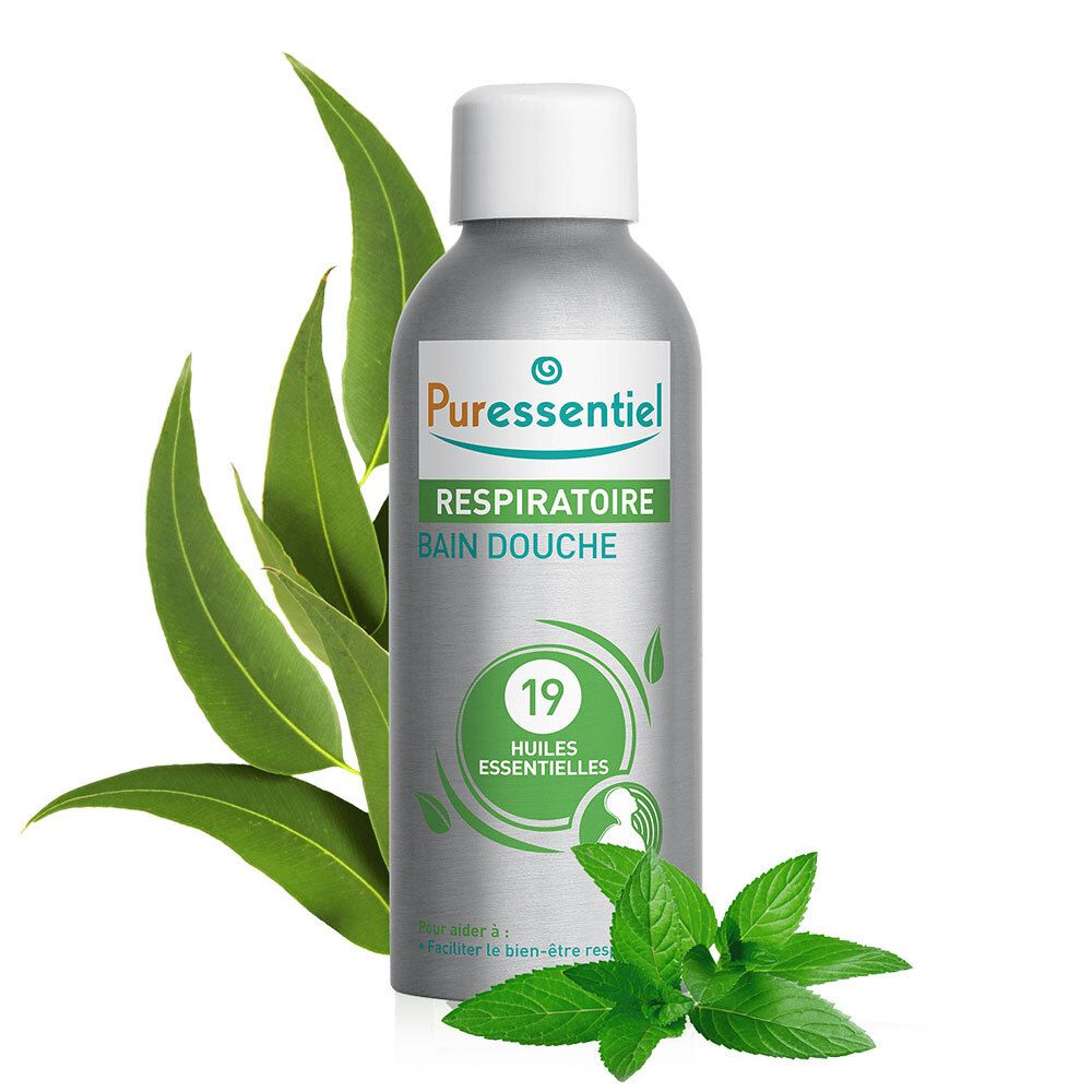 Zilveren fles met witte dop. Opschrift: Respiratoire Bain Douche, 19 Huiles Essentielles. Eucalyptus- en muntbladeren.