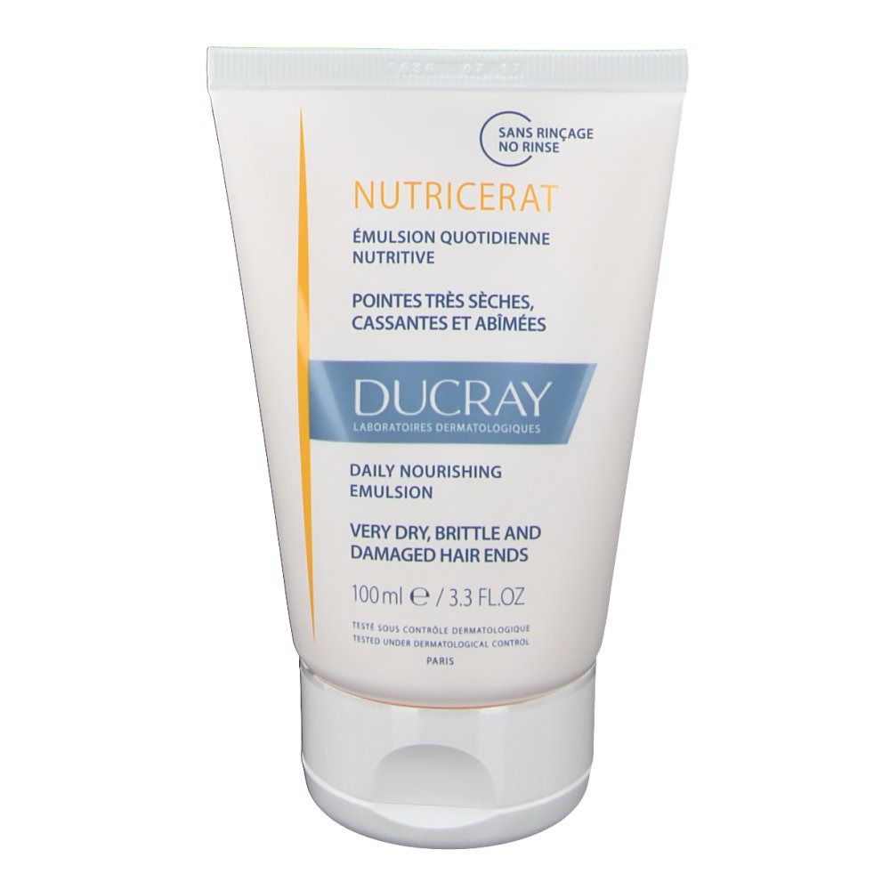 Tube blanc et bleu avec texte et nom de produit. "Sans rinçage" et "100ml" visibles.