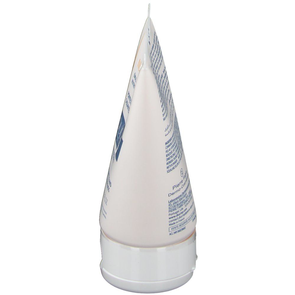 Vue latérale d'un tube blanc avec texte. Le bouchon est blanc.