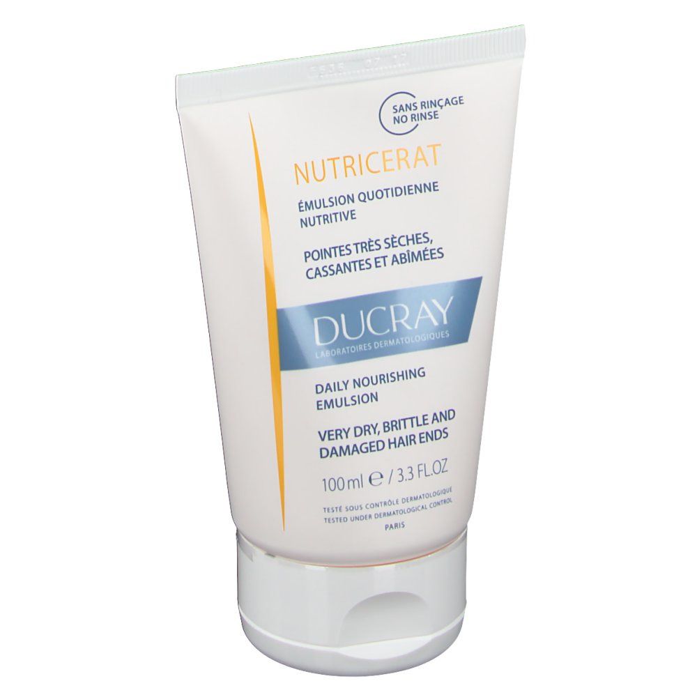 Tube blanc et bleu avec texte et nom de produit. "Sans rinçage" et "100ml" visibles.