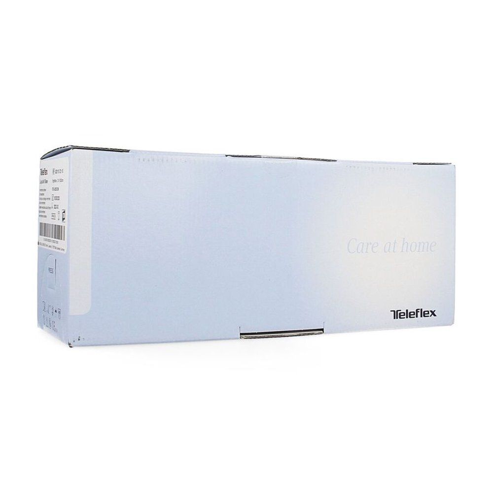 Emballage en carton. Inscription "Care at home" et Teleflex. Étiquette avec code-barres et informations.