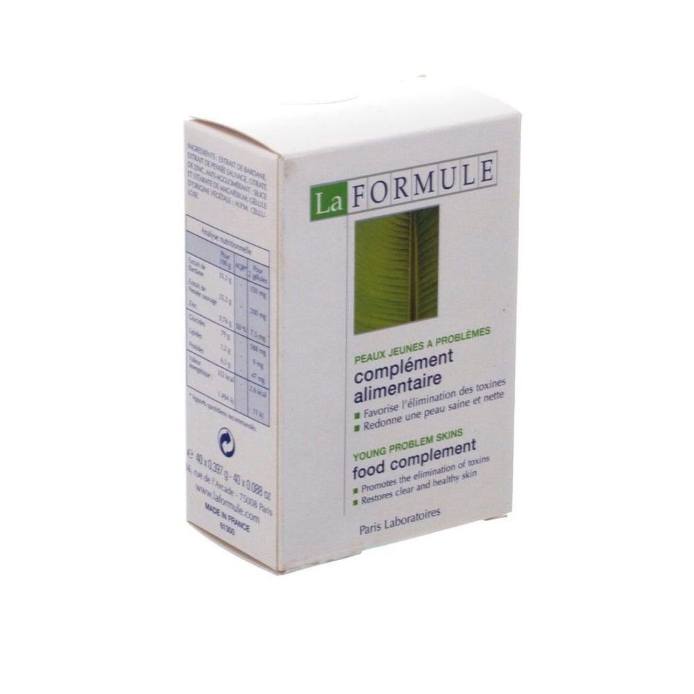 Boîte blanche La FORMULE. Texte : Peaux jeunes à problèmes complément alimentaire. Texte anglais : Young problem skins food complement.