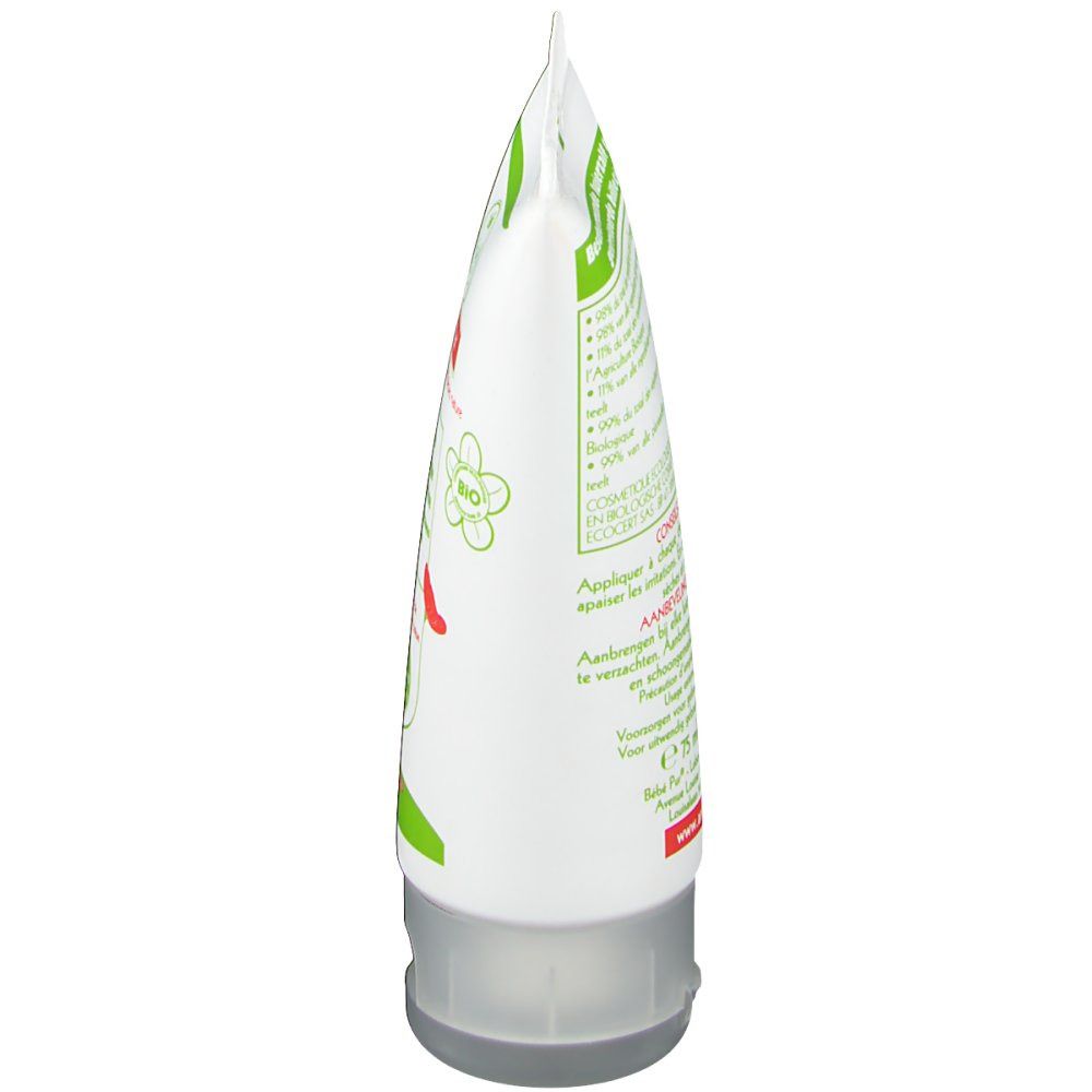 Vue latérale d'un tube blanc avec décorations vertes et rouges. Fermeture transparente.