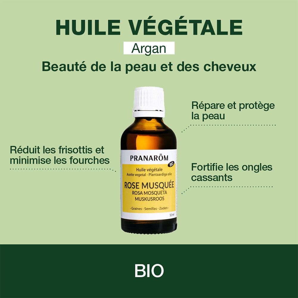 Flacon de produit sur fond vert. Texte : Huile Végétale Argan. Avantages pour la peau et les cheveux.