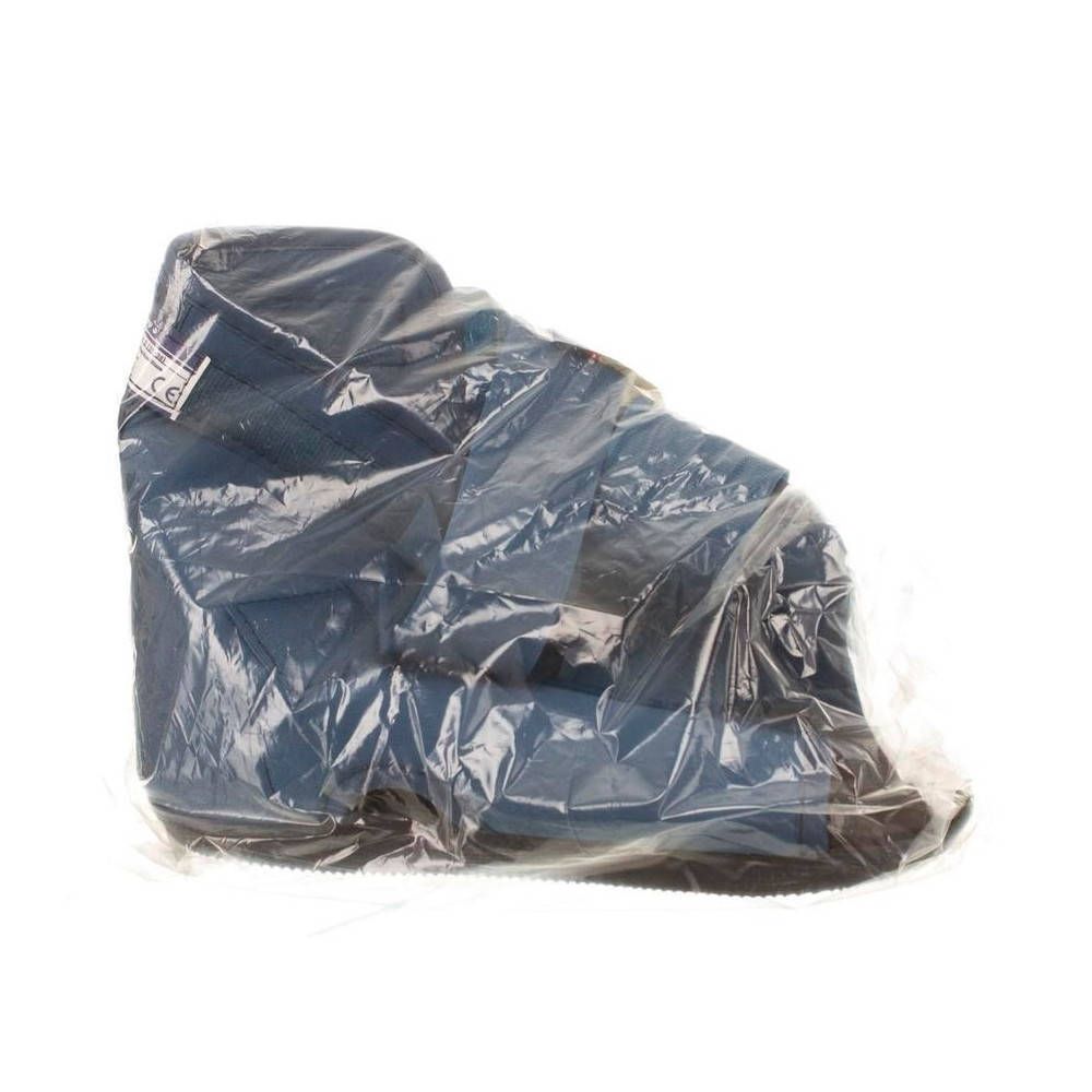 Attelle de chaussure bleue emballée dans du plastique. Marquage CE visible.