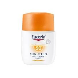 Witte fles met oranje dop. Opschrift: Eucerin, Sun Fluid 50, matterend.