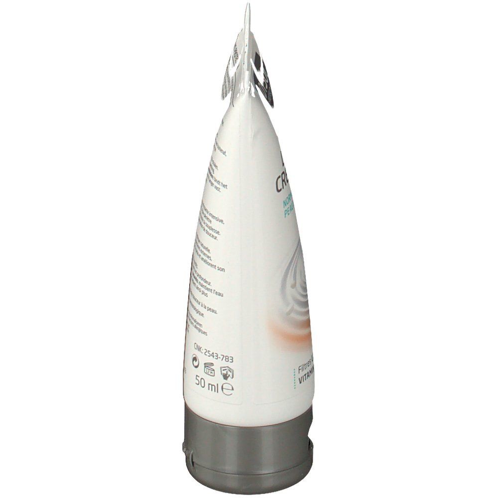 Zijaanzicht van de crèmetube. Tekst op de tube. Bevat informatie over ingrediënten en gebruik.