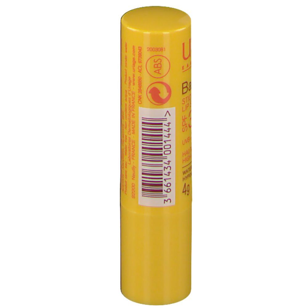 Stick à lèvres jaune avec code-barres et texte. Contient informations fabricant.