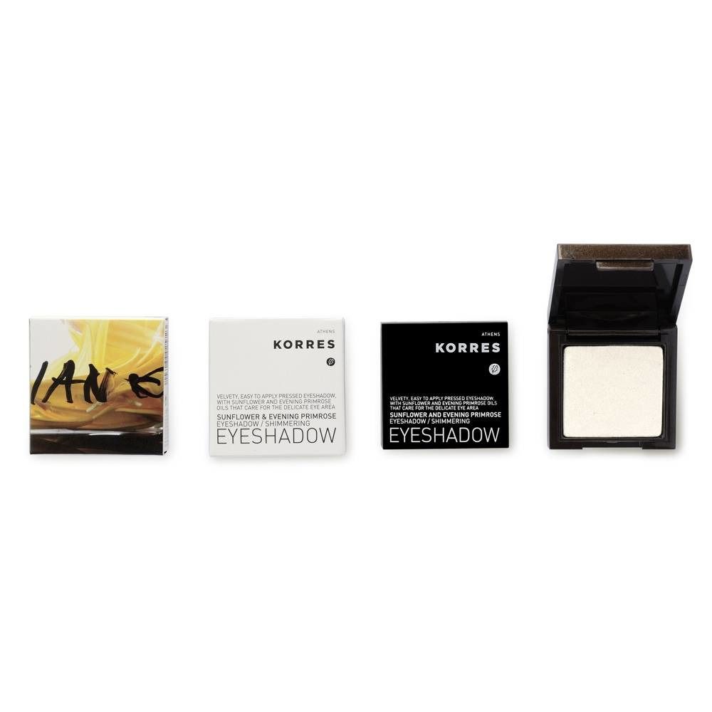 Quatre produits côte à côte. À gauche : emballage jaune. Deuxième : emballage blanc avec texte. Troisième : emballage noir. À droite : fard à paupières ouvert.