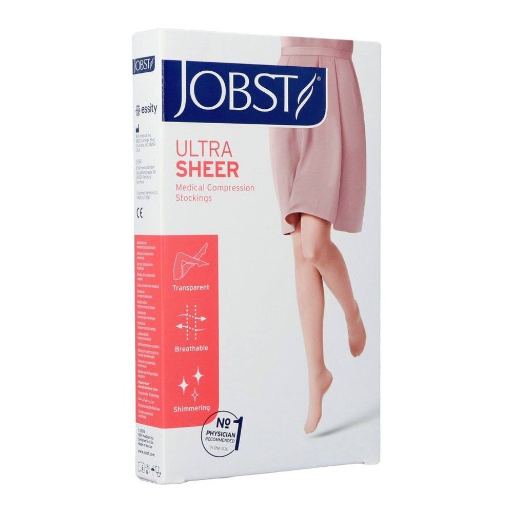 Verpakking met JOBST Ultra Sheer medische compressiekousen. Afbeelding van een vrouw met kousen. Eigenschappen: transparant, ademend, glanzend.