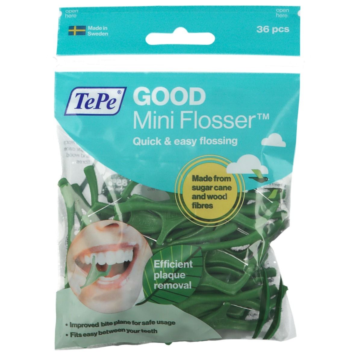 Verpakking met groene TePe Mini Flosser. 36 stuks. Opschrift "GOOD Mini Flosser". Illustratie van een mond.
