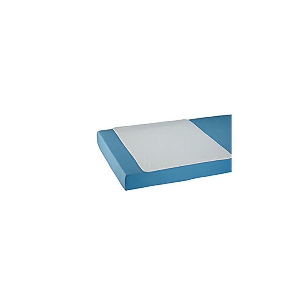 Tissu blanc rectangulaire sur un coussin bleu. Le tissu recouvre une partie du coussin.