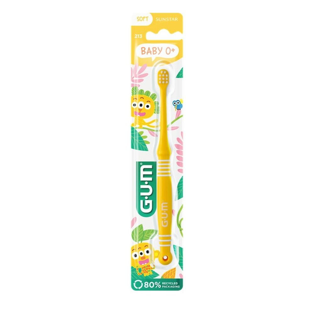 Groene baby-tandenborstel in verpakking. Merk G.U.M, Baby 0+. Borstelharen, handvat en verpakking zichtbaar.