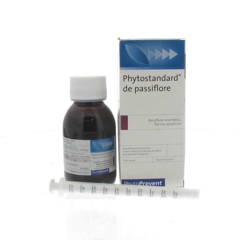 Flacon en verre brun et boîte avec texte Phytostandard de passiflore. Seringue incluse.