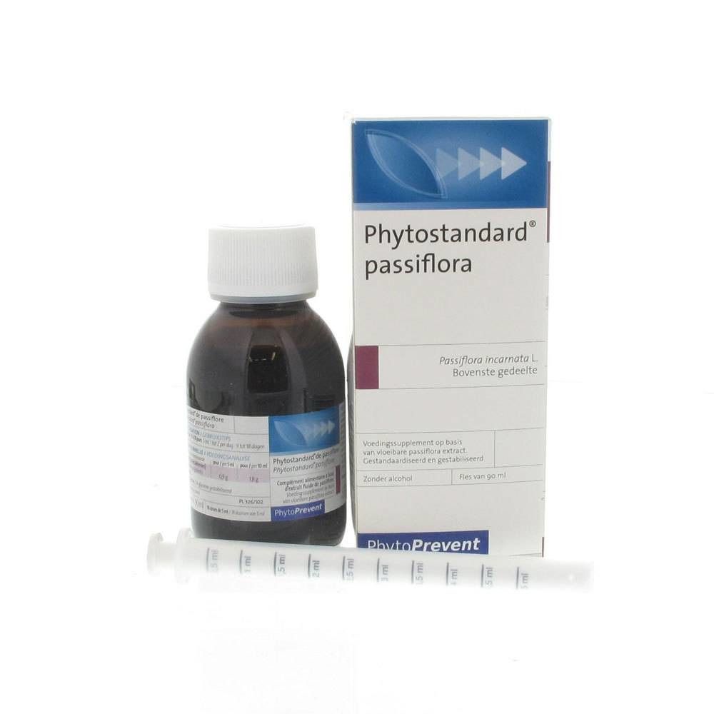 Flacon en verre brun et boîte avec texte Phytostandard passiflora. Seringue incluse.