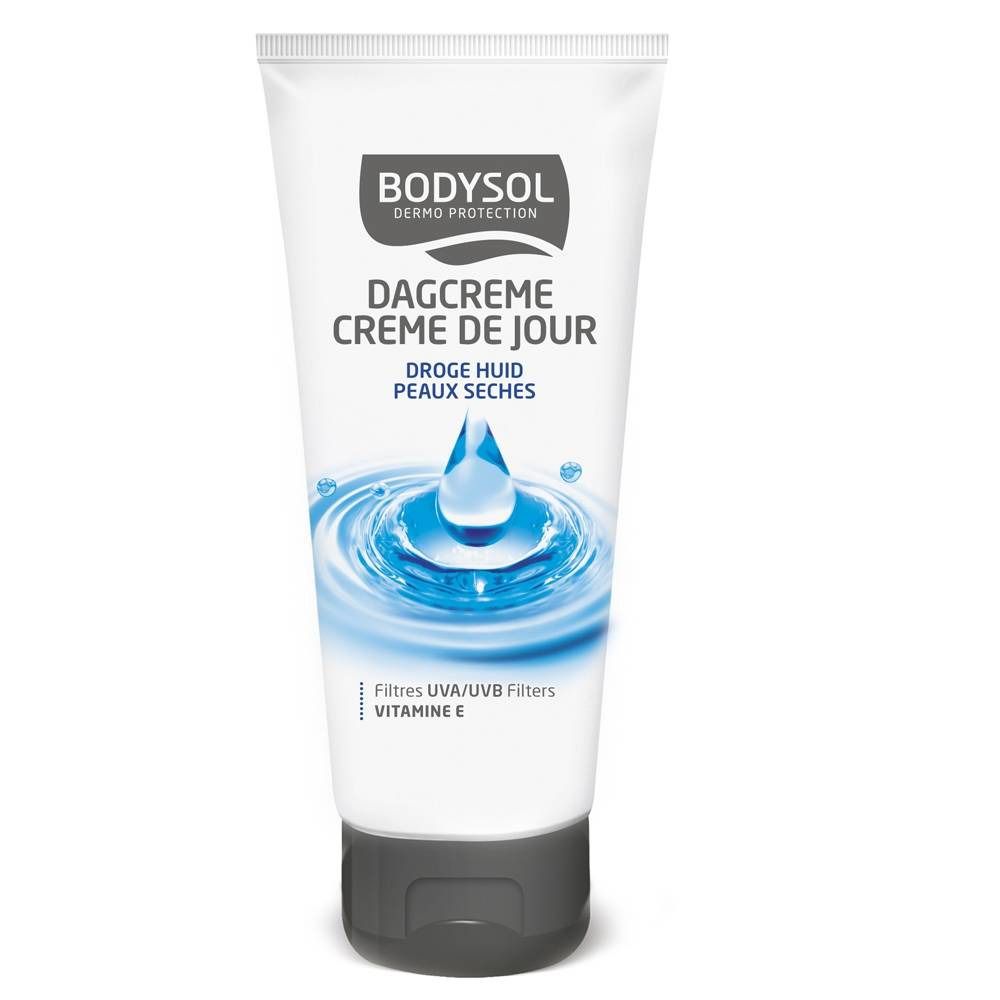 Tube blanc Bodysol. Inscription: Dagcrème, Crème de Jour, Droge Huid, Peaux Seches. Filtres UVA/UVB, Vitamine E. Goutte d'eau bleue. Logo Bodysol en haut.