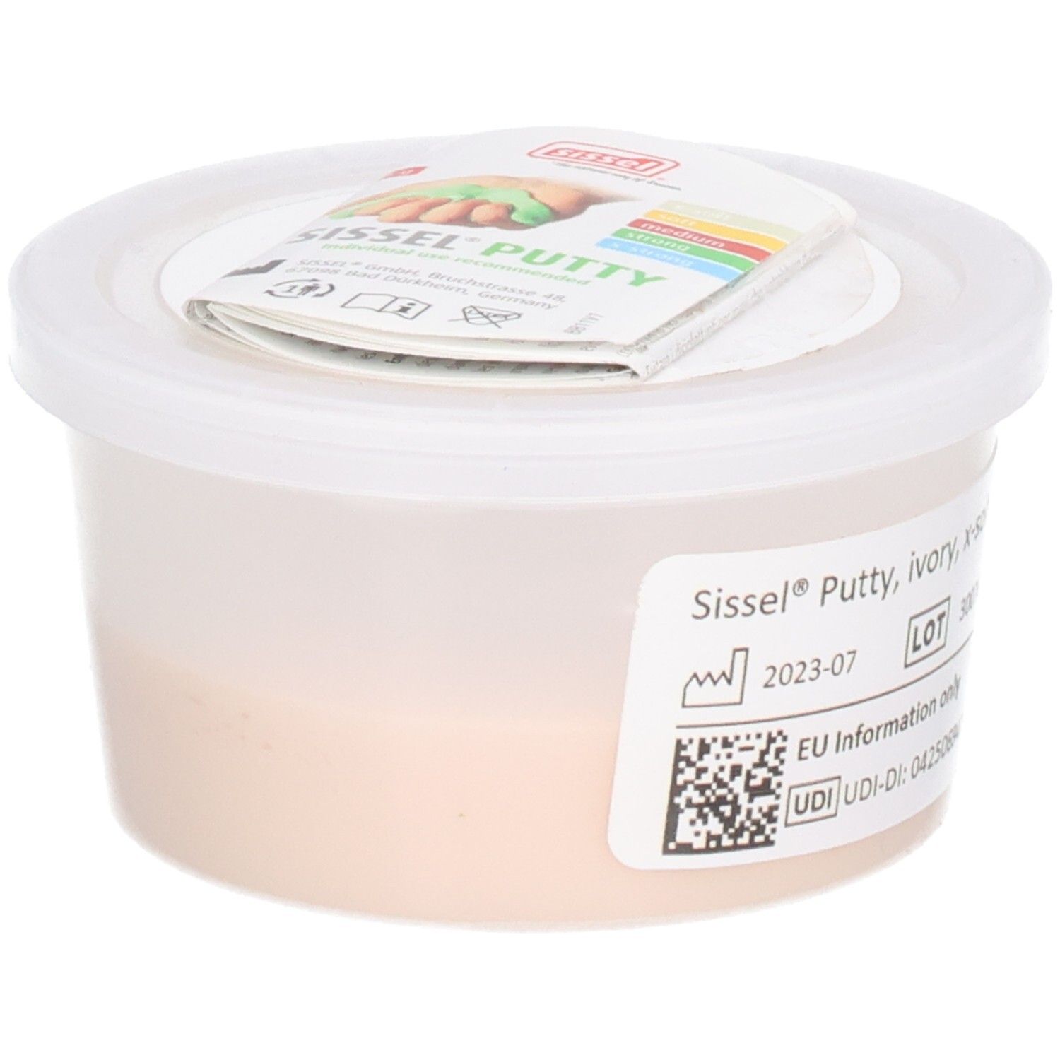 Beige kneedmassa in een ronde, witte container met deksel. Etiket met productnaam, houdbaarheidsdatum en CE-markering.