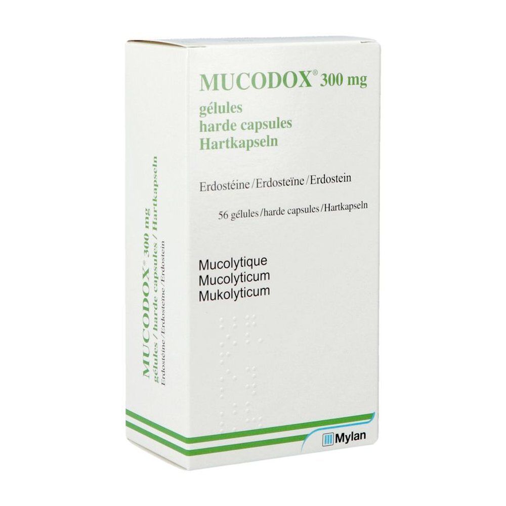 Witte doos Mucodox 300 mg. Opschrift: harde capsules, 56 stuks. Mylan logo.