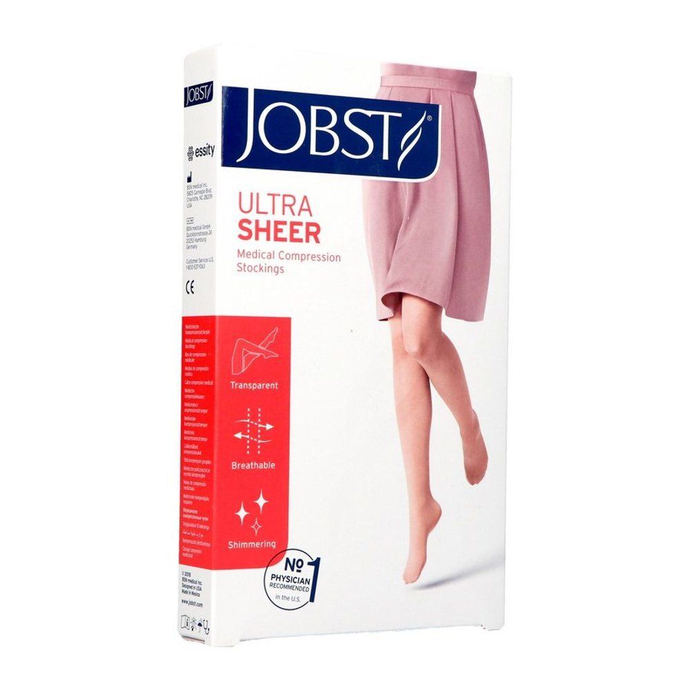 Jobst Ultrasheer, medische compressiekousen. Verpakking met been met kousen. Transparant, ademend, glanzend.