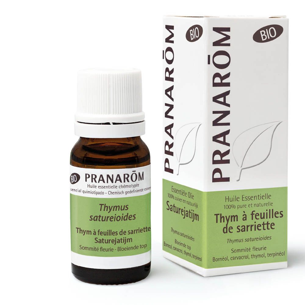 Flacon en verre brun avec bouchon blanc et boîte blanche. Informations sur le produit.