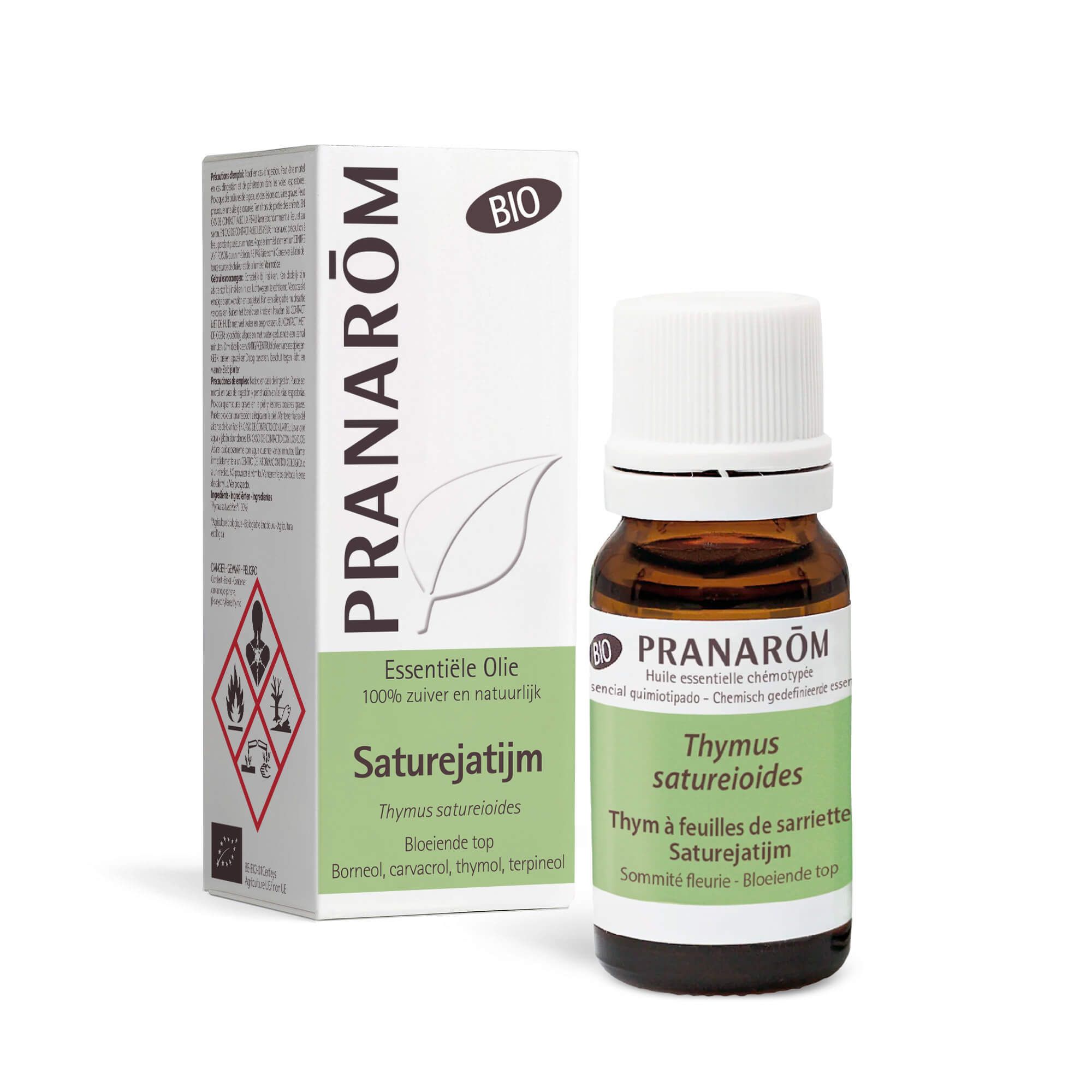 Doos en fles van PRANAROM. Opschrift: Saturejatim. BIO-certificering. Gevarensymbolen. Witte dop.