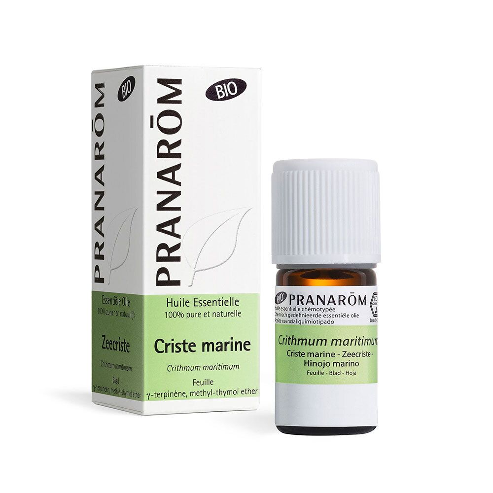 Bruine glazen fles met witte dop en doos. Opschrift: PRANAROM, Criste marine, BIO.