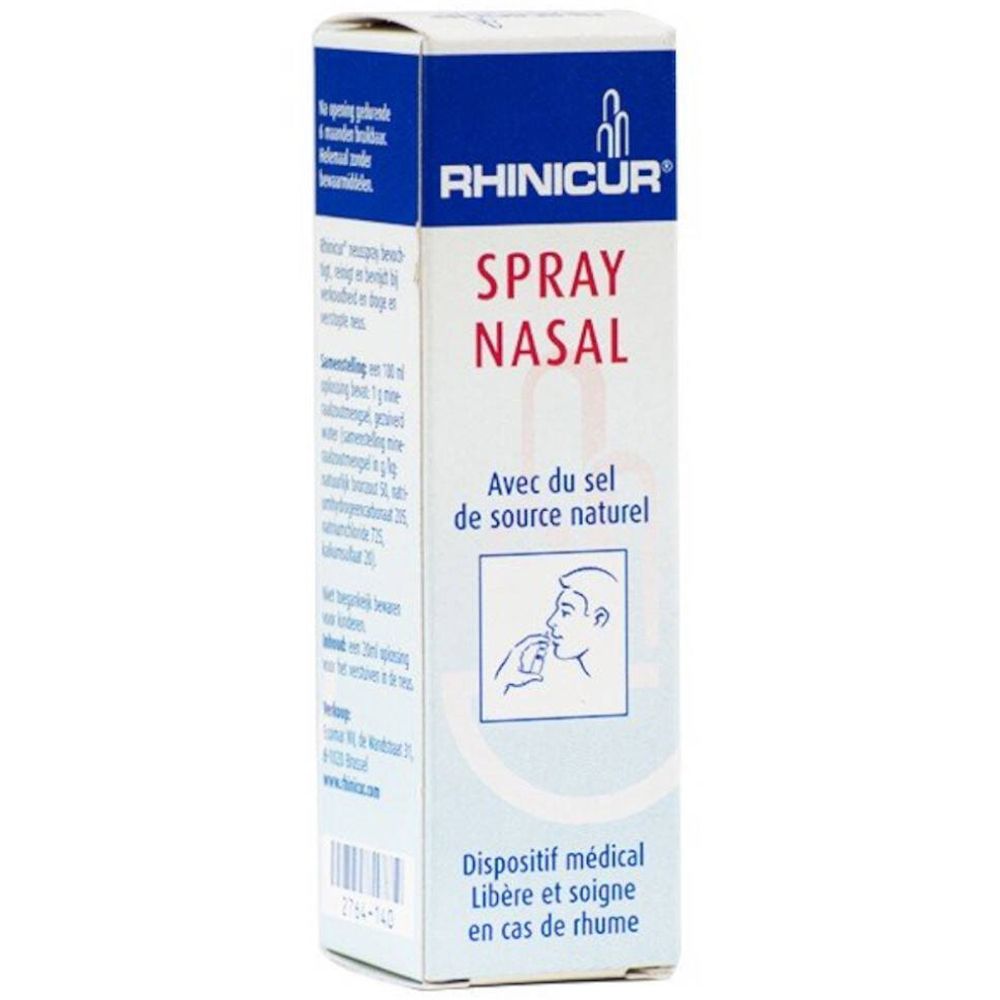 Boîte de spray nasal. Inscription: Spray Nasal, Avec du sel de source naturel. Illustration d'une personne utilisant le spray. Couleurs: bleu et blanc.