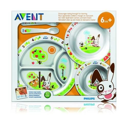 Ensemble d'apprentissage avec assiettes, bols, cuillère et fourchette. Motifs animaux et lapin. Emballé dans une boîte.