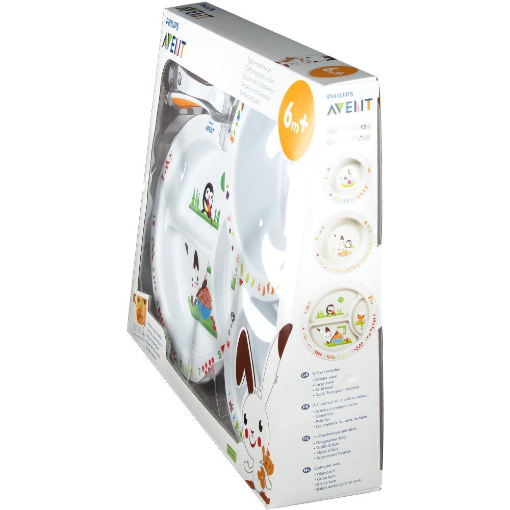 Ensemble d'apprentissage en boîte. Vue latérale de l'emballage. Assiettes, bols, cuillère et fourchette.