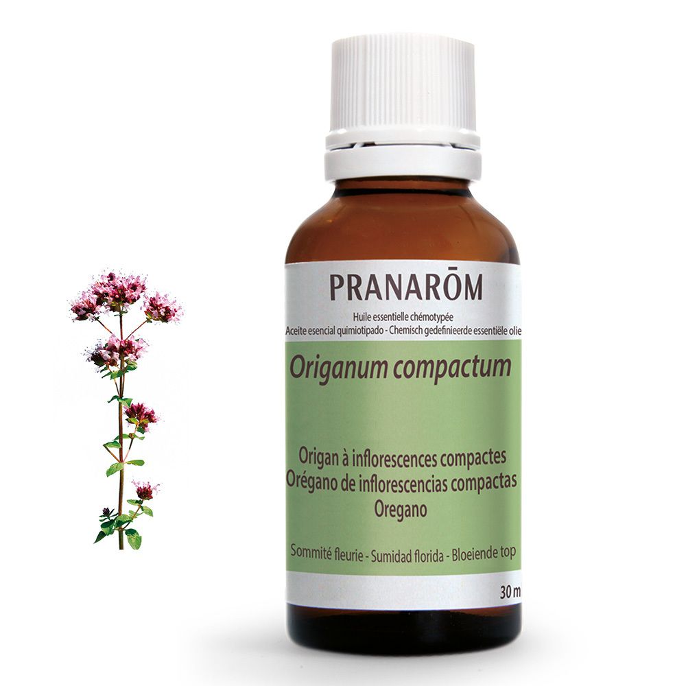 Bruine glazen fles met witte dop. Etiket met productnaam en bloemenillustratie. Daarnaast oregano plant.