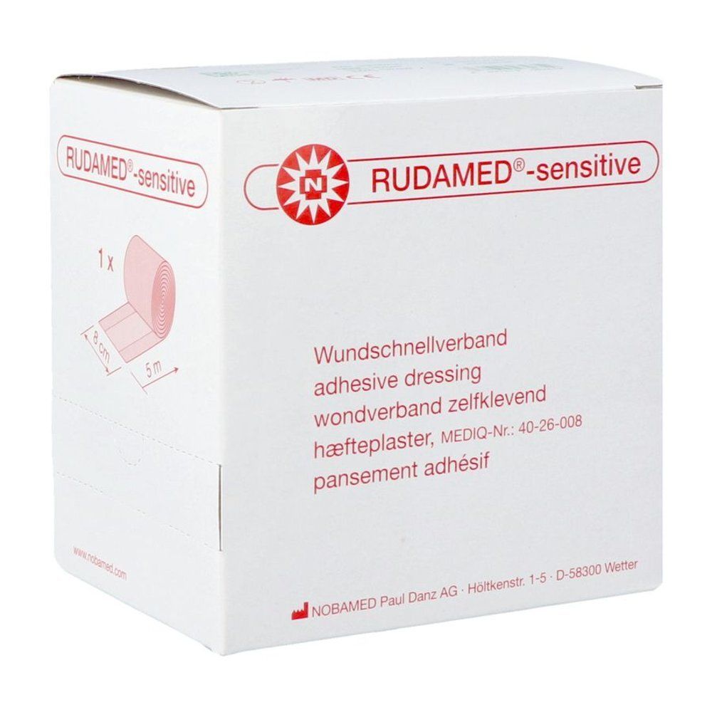 Witte verpakking met rode tekst RUDAMED®-sensitive. Weergave van een verband. Tekst: wondverband zelfklevend, MEDIQ-Nr. 40-26-008.