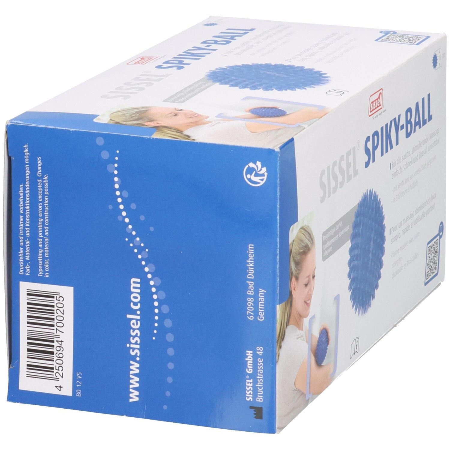 Boîte Sissel Spiky-Ball. Balle de massage bleue. Impression: www.sissel.com, code-barres, adresse. Femme avec balle. Texte en allemand.
