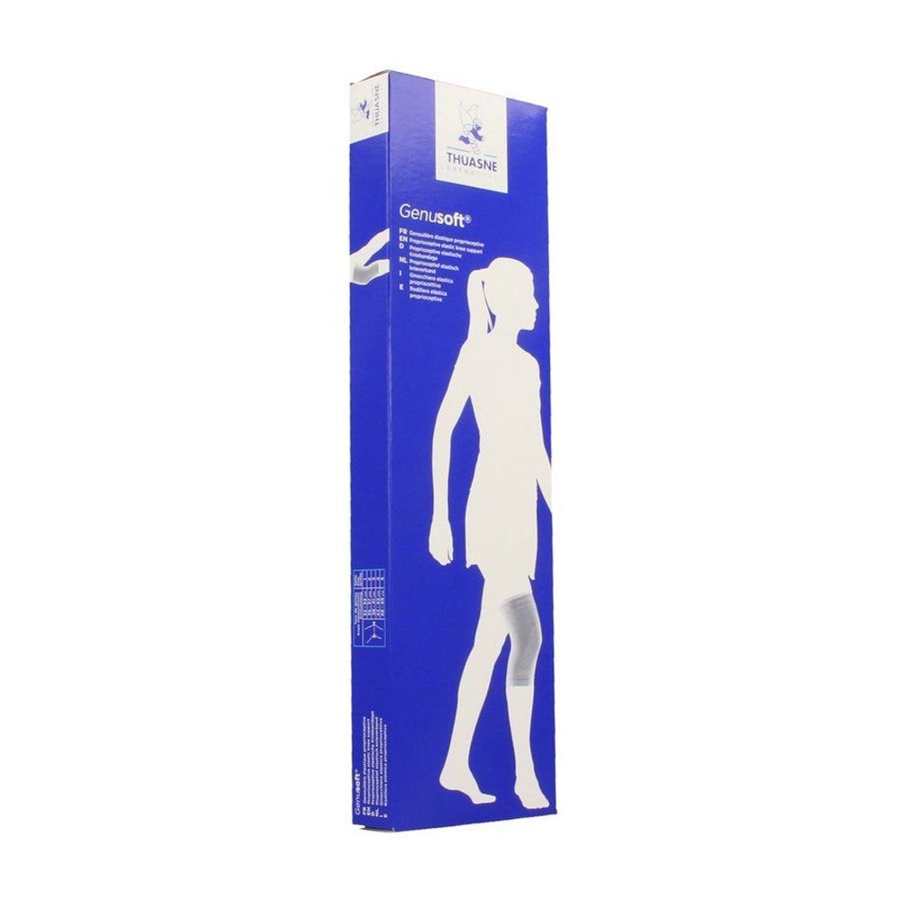 Emballage bleu avec silhouette blanche d'une femme. Inscription: Thuasne, Genusoft. Illustration du produit sur le genou.