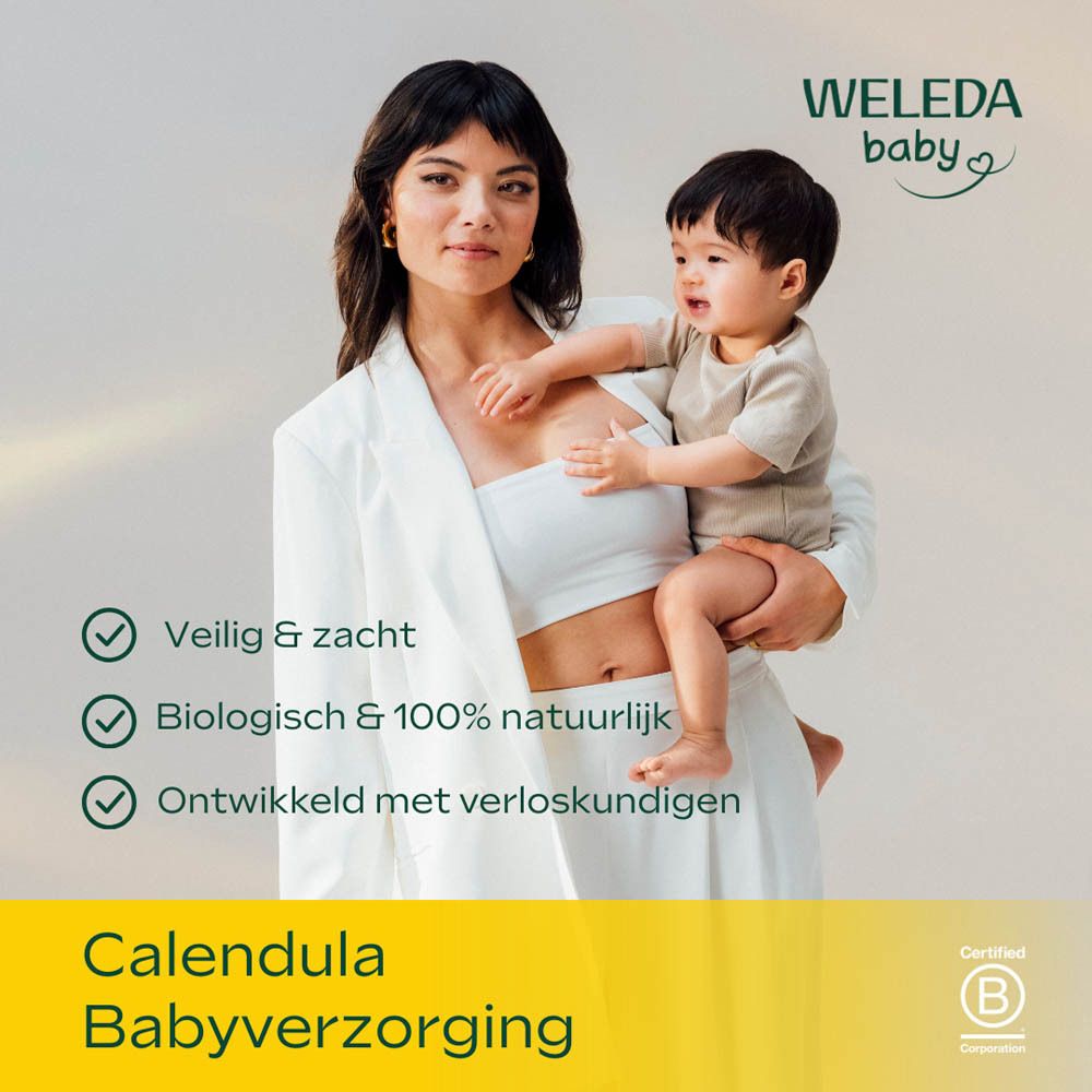 Weleda Baby Cremebad fles met gele dop, etiket met madeliefje en lieveheersbeestje, 200 ml.