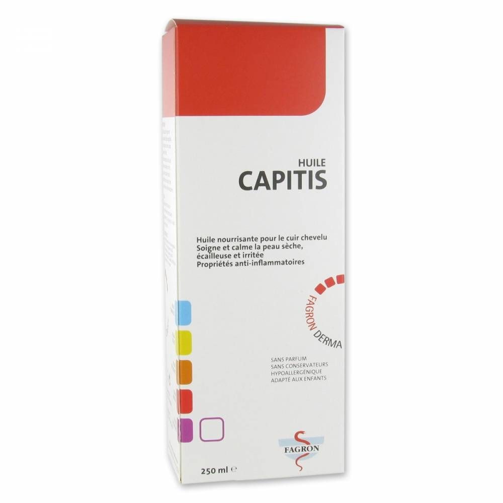 Verpakking van Capitis Oil. Witte doos met rode bovenkant. Productnaam en informatie in het Frans.