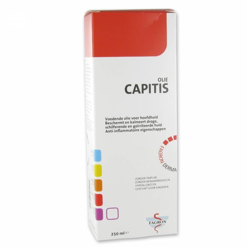 Verpakking van Capitis Oil. Witte doos met rode bovenkant. Productnaam en informatie in het Nederlands.