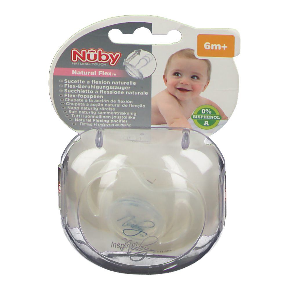 Sucette dans un emballage transparent. Marque Nûby, inscription 'Natural Touch'. Recommandation d'âge : 6m+. Bébé sur l'emballage.