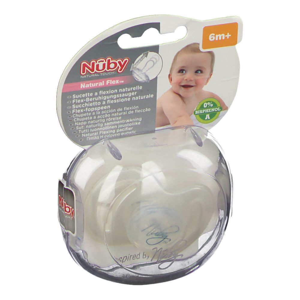 Sucette dans l'emballage. Marque Nûby, inscription 'Natural Touch'. Recommandation d'âge : 6m+. Bébé sur l'emballage.