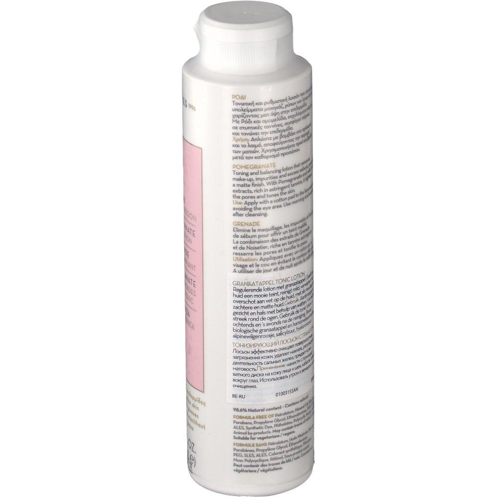 KORRES® Grenade Toner. Bouteille blanche avec étiquette rose. Texte et ingrédients imprimés. Bouchon blanc.
