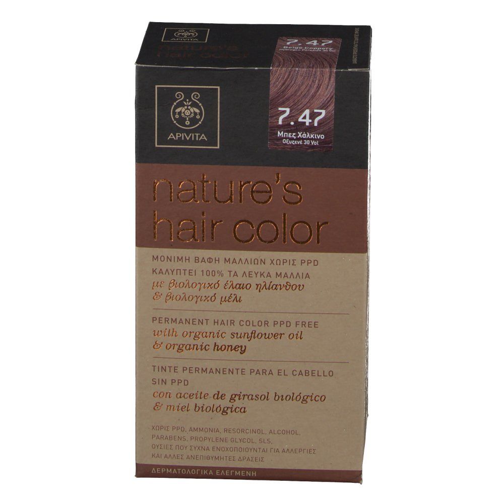 Boîte de coloration capillaire, vue en biais. Inscriptions : Apivita, nature's hair color, teinte 7.47.
