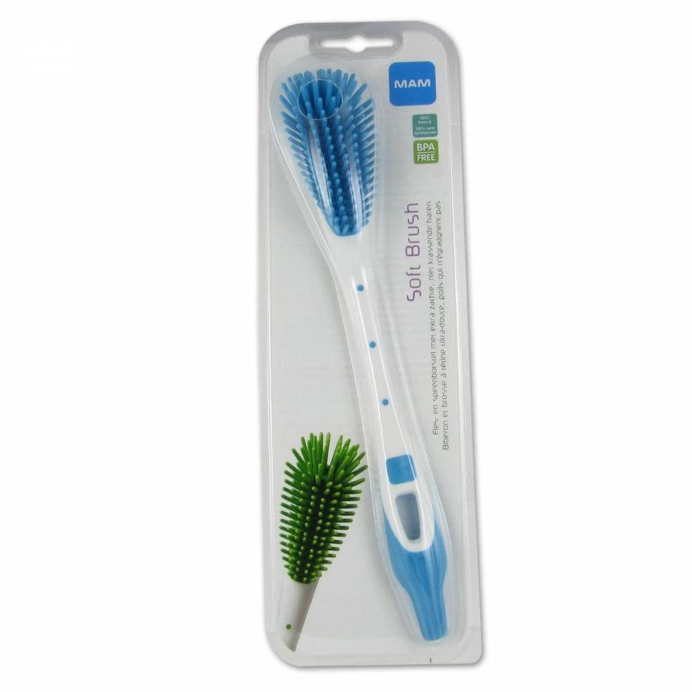 Brosse souple dans son emballage. Tête de brosse bleue, manche blanc avec accents bleus. Marque MAM, sans BPA.