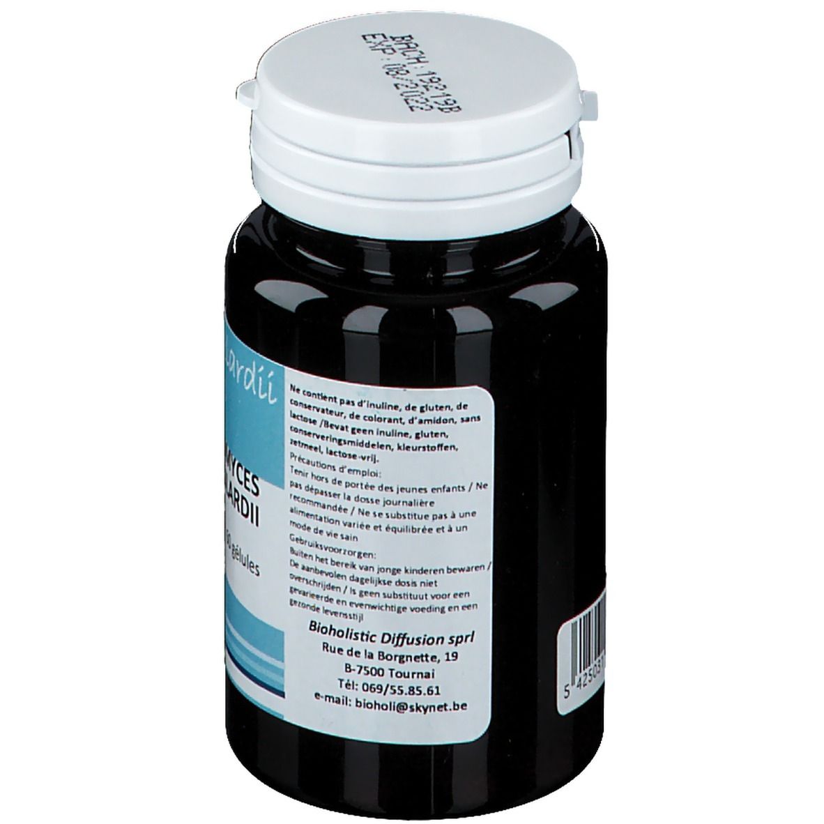 Donkere fles met witte dop. Tekst op etiket: informatie over ingrediënten, waarschuwingen en adres van de fabrikant.