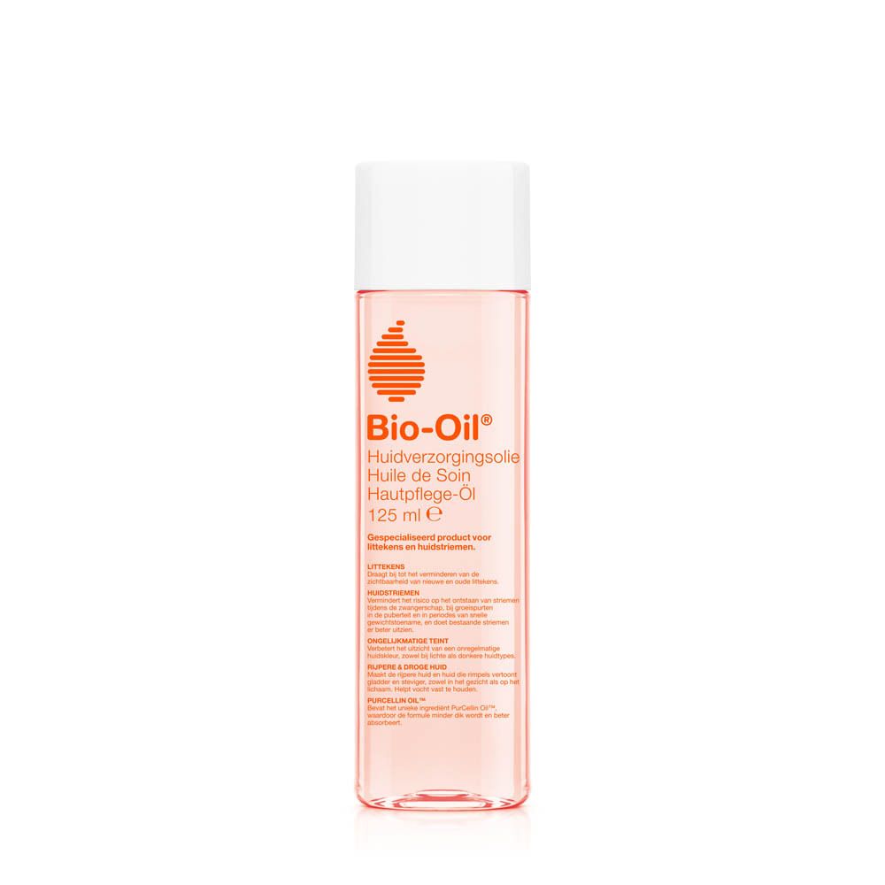 Flacon cylindrique avec bouchon blanc. Inscription Bio-Oil, 125 ml. Liquide rosé.