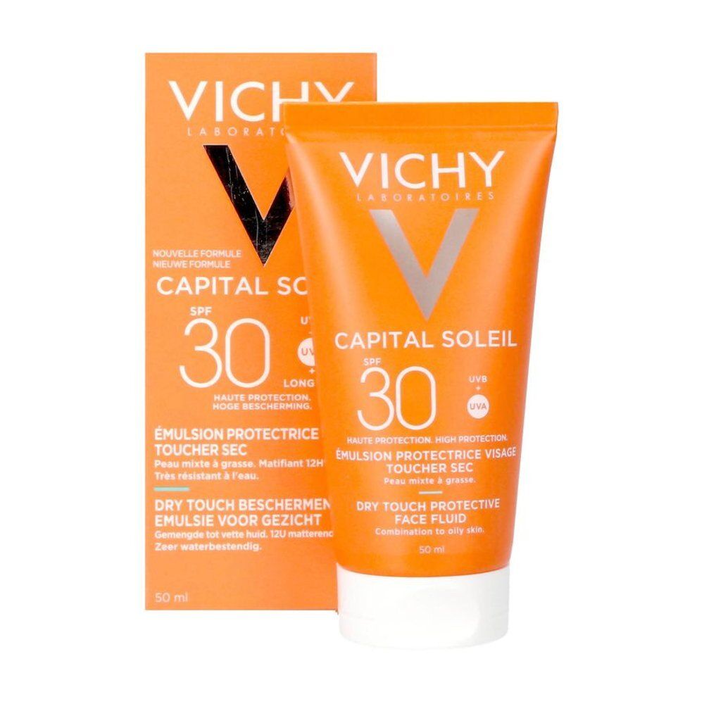 Vichy Capital Soleil SPF30. Oranje tube en doos. Tekst: "Nouvelle Formule", "Emulsion Protectrice", "Dry Touch". 