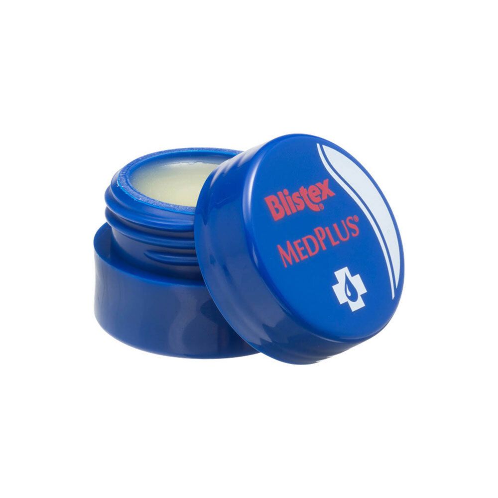 Open blauwe pot Blistex MedPlus. Deksel ernaast. De inhoud is zichtbaar.